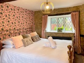 A bedroom with a bed and window at 