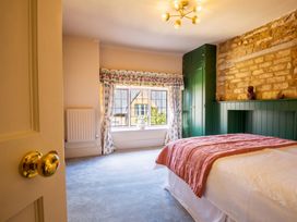A bedroom with a window and a bed at 