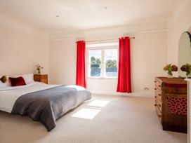 A bedroom with a bed and window at the property