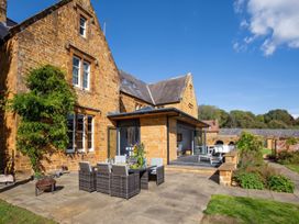 A patio with table and chairs at a house