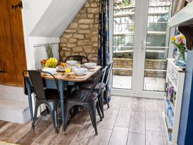 A dining room with a table set for breakfast at The Old Barn in Manchester