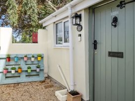 A exterior view with a door and plants at 145