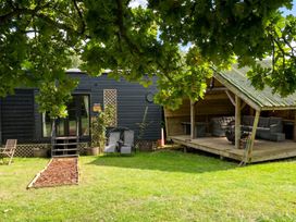 An outdoor area with a staircase and deck at a property