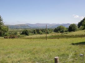 A landscape with grass and trees at Swallow's Nest in Keswick