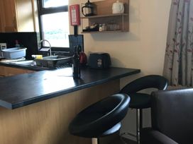 A kitchen with a sink and toaster at Primrose Lodge Saltburn-by-the-Sea