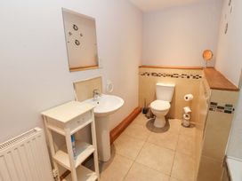 A bathroom with a sink and toilet at Cooper Cottage in Potto near Stokesley