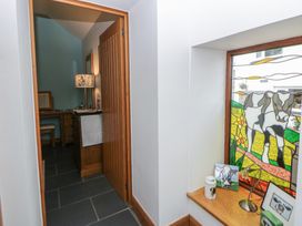 A hallway with a window and desk at Yr Hen Llaethdy in Blaen-Cil-Llech near Newcastle Emlyn