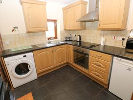 A kitchen with various appliances at The Stall in Penuel near Llanmorlais