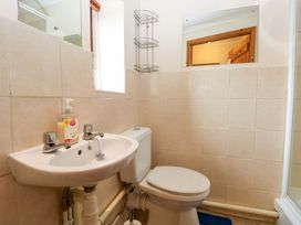 A bathroom with a sink and toilet at The Stall in Penuel near Llanmorlais