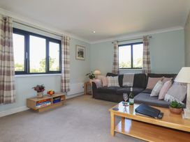A living room with a sofa and coffee table at The Station Flat St Newlyn East near Newquay