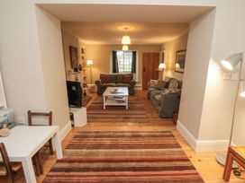 A living room with a sofa and coffee table at Brookleigh Hutton-le-Hole