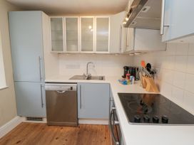 A kitchen with cabinets and appliances at Brookleigh in Hutton-le-Hole