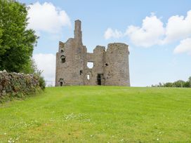 A view of stone ruins on grass at Ballaghboy Cottage in Boyle, County Sligo