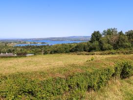 A view of a lake and fields at Ballaghboy Cottage in Boyle, County Sligo