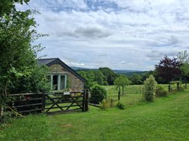 A house with a gate and fence at Woodstone Barn Whitchurch near Tavistock