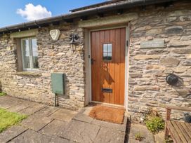 A doorway with stone wall and pathway at Winster Fields, Cartmel Fell near Windermere