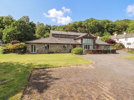 A house with a garden and pathway at Winster Fields Cartmel Fell near Windermere