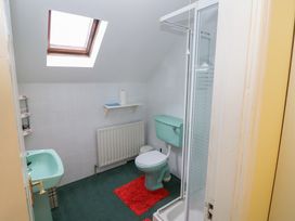 A bathroom with a shower, toilet and sink at The Farmhouse in Dunmanway, County Cork