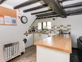 A kitchen with appliances and a counter at Wethercote Cottage Old Byland near Helmsley