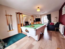 A game room with a pool table and television at Boundcliffe Farm Allerston near Pickering