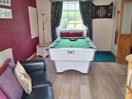 A game room with a pool table and dart board at Boundcliffe Farm Allerston near Pickering