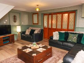 A living room with a coffee table and two sofas at Boundcliffe Farm in Allerston near Pickering