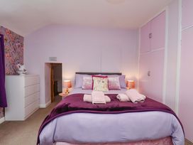 A bedroom with a bed and dresser at Boundcliffe Farm Allerston near Pickering