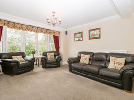 A living room with seating and a coffee table at The Croft in Vowchurch near Peterchurch