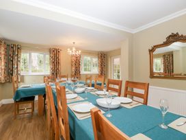 A dining room with a table set for a meal at The Croft in Vowchurch near Peterchurch