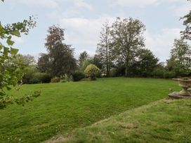 A garden with trees and grass at The Croft in Vowchurch near Peterchurch