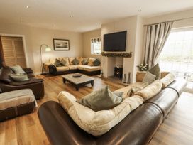 A living room with sofas and a coffee table at White Gables near Cockermouth