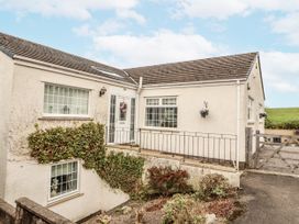A house with a front door and windows at White Gables Great Clifton near Cockermouth