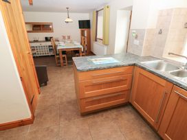 A kitchen with dining area in Bwthyn Trecoed St. Clears near Carmarthen