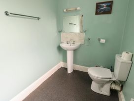 A bathroom with a sink and toilet at Halford Hill in Llanberis