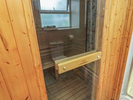 A sauna with a toilet and towel at Halford Hill in Llanberis