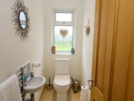 A bathroom with a sink and toilet at Rowantree, Beaufort, County Kerry
