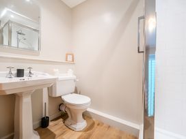 A bathroom featuring a sink, toilet, and shower at Jubilee at the Graythwaite Estate near Hawkshead