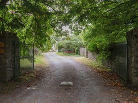 An entrance with a gate and gravel path at Mrs Delaney's Loft Ardfinnan near Clonmel County Tipperary