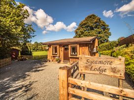 A cabin with sign at Sycamore Lodge Nantmel near Rhayader