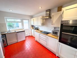 A kitchen with appliances and a sink at 38 Dale End Brancaster Staithe near Burnham Market