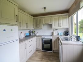 A kitchen with appliances and counter space at Findale Carne near Rosslare, County Wexford