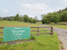 A sign for Ty Gwyn Cottages at the entrance near Llangwm near Bala
