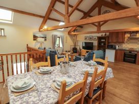 An open plan living room and dining area at Hayloft Cottage Bolton Low Houses