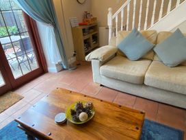A living room with a sofa and coffee table at Sea Lily New Haggerston near Holy Island