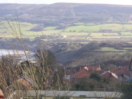 A view of hills and houses at Heather Croft in Robin Hood's Bay