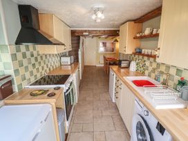 A kitchen with appliances and fixtures at 29 High Street, Aldeburgh