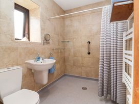 A bathroom with a sink and toilet at Pound Cottage in Huntshaw near Great Torrington