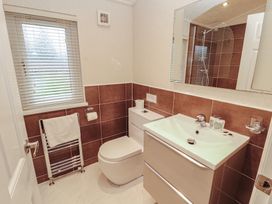 A bathroom with toilet and sink at Beech Hill Lodge (Beech Hill 9) at Fallbarrow Park, Bowness-on-Windermere