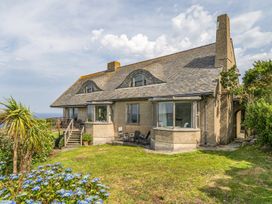 A house with a garden and stairs at Cragford in Sennen Cove