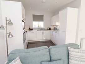 A kitchen with a sink and appliances at The Haven in Embleton